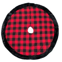 a red and black buffalo plaid dog bed with a white circle in the center on a white background