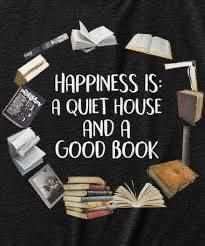 a t - shirt that says happiness is a quiet house and a good book on it