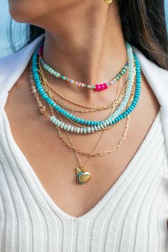 This modern mixed rainbow gemstone and pearl necklace is a must have. The elegant mix of pearls and gemstones including opals, turquoise, quartz and more make this beaded bracelet versatile and an instantaneous favorite.✦ Other necklaces sold separately - Kyani is wearing the 15"+ Length ✦✦ DETAILS ✦✧ Name: Kainui (kaee NOO ee) - big sea, great sea.✧ Mixed Gemstones and Freshwater Pearls.✧ Adjustable fit - choose your length.✧ 14kt Gold Filled components and clasp.✧ All Ke Aloha Jewelry pieces c Heishi Bead Necklace, Pearl Necklace Outfit, Chunky Gold Necklaces, Necklace Outfit, Ethiopian Opal Necklace, Blue Opal Necklace, Tropical Jewelry, Beachy Jewelry, Fire Opal Necklace