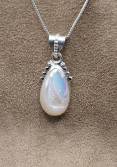 "Beautiful Druzy Quartz Pendant Comes with 18\" Sterling Silver chain Top: 30 mm x 16 mm; 1-1/4\" x 5/8\" Weight 5.9 Grams Sterling Silver 925, Handmade $75 Exclusively Designed by Richard James for Richlo Jewelry Check out our other fine jewelry at: https://www.etsy.com/shop/arizonagemstudio" Iridescent Nickel-free Sterling Silver Necklace, White Sterling Silver Pendant Crystal Necklace, White Sterling Silver Crystal Pendant Necklace, Iridescent Cabochon Necklace As Gift, White Round Necklace For Memorial, White Round Necklaces For Memorial, White Memorial Necklace, Iridescent Teardrop Pendant Necklace For Gift, Teardrop Cabochon Necklace For Anniversary