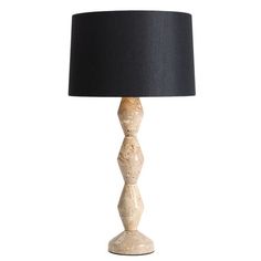 a table lamp with a black shade on the top and bottom part of it's base