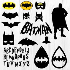 batman silhouettes and letters on white wood