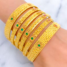 Vibrant Festive Floral 22k Gold Bangle Set 22k Gold Meenakari Bangle In Yellow Gold, 22k Yellow Gold Meenakari Bangle, 22k Yellow Gold Bangle With Meenakari, Hand Set 22k Gold Festive Bracelets, Luxury Gold Bangle For Festive Season, Hand-set Yellow Gold Bracelets For Diwali, Hand Set Yellow Gold Bracelet For Diwali, 22k Yellow Gold Festive Bracelet, Elegant Gold Meenakari Bracelets