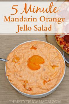 an orange jello salad in a bowl with the words 5 minute mandarin orange jello salad