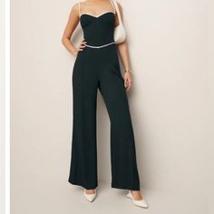 Black Body Suit With Flared Style Bottom Elegant Fitted Black Pantsuit, Elegant Black Fitted Pantsuit, Fitted Sleeveless Pantsuit For Cocktail, Elegant Fitted Bottoms With Lined Body, Sleeveless Fitted Cocktail Pantsuit, Fitted Sleeveless Cocktail Pantsuit, Elegant Fitted Pants For Cocktail, Elegant Strapless Jumpsuit For Date Night, Elegant Fitted Cocktail Pants