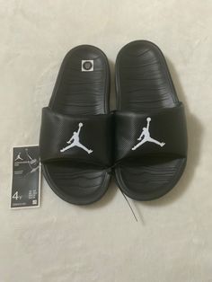 NEW WITH TAGS   NO BOX 4 YOUTH BLACK JORDAN BREAK SLIDES NO RETURNS ACCEPTED U S BIDDERS ONLY Black Beach Slides, Black Sporty Open Toe Slides, Black Open Toe Slides For Sports, Black Open Toe Sporty Slides, Casual Black Open Toe Slides, Comfortable Non-slip Black Slides, Black Sporty Non-slip Slides, Black Round Toe Slides For Streetwear, Black Synthetic Slides For Streetwear