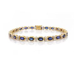 This is part of Chairish’s Fine Jewelry assortment.  This 6.91 CTW Natural Blue Sapphire Diamond Wedding Tennis Bracelet in 18K gold showcases endlessly sparkling natural blue sapphire of 6.91 carats and 0.97 carats diamonds. It measures 7.25 inches long in length.  Sapphire stimulates concentration and reduces stress.  Designed with perfect oval cut blue sapphire set with a diamond to make you stand out on any occasion or event. The elegant style complements the attire beautifully and is a perf Timeless Blue Bracelet For Formal Occasions, Oval Sapphire Tennis Bracelet With 17 Jewels, Luxury Yellow Gold Jewelry With Lab-created Sapphire, Timeless Blue Jewelry With Diamond Accents, Timeless Blue Lab-created Sapphire Jewelry, Blue Oval Diamond Bracelet With Jewels, Luxury Oval Sapphire Tennis Bracelet, Blue Brilliant Cut Bracelet Jewelry, Luxury Blue Sapphire Bracelets