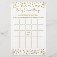 a baby shower game with gold stars on it