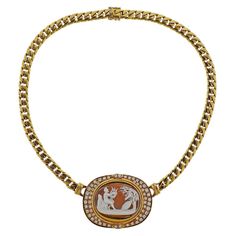 18k yellow gold pendant on curb link necklace. Set with diamonds approx. 1.50ctw, and shell cameo - 28mm x 19mm. Measures - 15.75" long x pendant 45mm x 33mm. Marked 18k 750. Weight 78.6 grams. Cameo Necklace, Yellow Gold Pendants, Link Necklace, Gold Pendant, Custom Jewelry, Necklace Set, Gold Diamond, Fashion Art, Modern Furniture