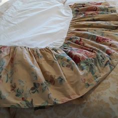 a dress is laying on top of a bed