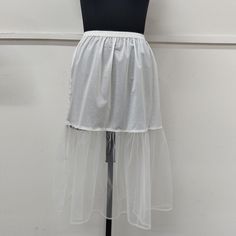 Discover the timeless allure of the cotton half slip. Crafted from high-quality cotton, it offers comfort and elegance. Perfect for a seamless silhouette, it adds a layer of modesty to skirts and dresses. Embrace classic style with this versatile wardrobe essential. Cotton Underskirt / Cotton Petticoat / Cotton Half Slip / Cotton Dress Liner ➡️Sale for 1 Cotton Net Frill Half Slip. ➡️100 % Light Weight Cotton. ➡️Care: Hand wash in cold water. Do not bleach.  ➡️Available sizes : (Measurements are of garment only) X-SMALL- Fits US Size 0-2 (Elastic waistband 21.5" inch relax to 24.5" inch stretched, Hip 35" inch). SMALL- Fits US Size 2-4 (Elastic waistband 23" inch relax to 27" inch stretched, Hip 38" inch). MEDIUM- Fits US Size 6-8 (Elastic waistband 27" inch relax to 32" inch stretched, Hi Elegant Cotton Petticoat For Summer, Stretch Tiered Skirt Petticoat For Summer, Fitted Cotton Petticoat For Summer, Summer Tulle Petticoat With Crinoline, Summer Cotton Petticoat With Attached Cancan, Stretch Tiered Petticoat For Summer, Stretch Lined Skirted Petticoat, Summer Stretch Tiered Skirt Petticoat, Summer Stretch Tiered Petticoat