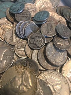 a pile of coins sitting next to each other