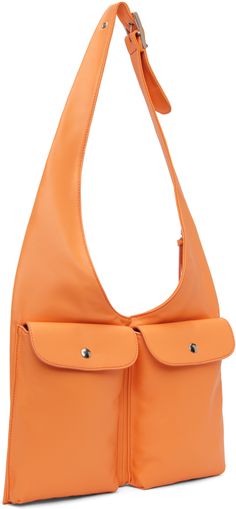 Grained leather shoulder bag in orange. · Adjustable shoulder strap · Flap pockets at face · Zip pockets at back face · Satin lining · H8.25 x W12.5 x D1 Supplier color: Orangina Office Satchel Shoulder Bag With Pockets, Modern Orange Crossbody Shoulder Bag, Modern Orange Leather Shoulder Bag, Modern Orange Shoulder Bag With Adjustable Strap, Modern Orange Shoulder Bag For Travel, Luxury Orange Shoulder Bag With Double Handle, Formal Orange Crossbody Shoulder Bag, Modern Office Shoulder Bag With Pockets, Formal Orange Top Handle Shoulder Bag