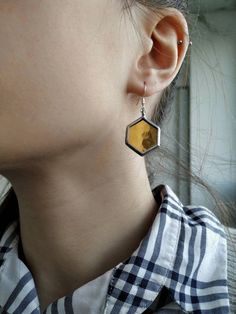 Amber raw honeycomb earrings yellow honey bee hex jewelry hexagon single dangles stained glass silver dangle set simple necklace minimalist jewelry Easter gift for mom gifts for women Simple honeycombs earrings in natural colors and with beautifull silver english closure. You can purchase it in every combination and also I have othe honeycomb jewelry in my shop to make a set for any peace you like. If you want it bigger or smaller with other closure or longer be open to contact me In my shop you Yellow Sterling Silver Single Earring, Minimalist Amber Sterling Silver Jewelry, Minimalist Sterling Silver Amber Jewelry, Handmade Honey Color Jewelry Gift, Handmade Honey-colored Jewelry For Gifts, Handmade Honey Jewelry For Gift, Minimalist Yellow Sterling Silver Jewelry, Octagon-shaped Yellow Jewelry For Gift, Yellow Octagon-shaped Jewelry Gift