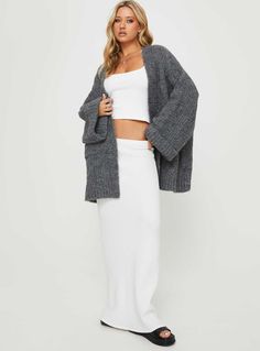 Oversized cable knit cardigan Drop shoulder, wide sleeves, folded back cuffs, twin hip pockets Good stretch, unlined  75% polyester 78% nylon 6% wool 1% spandex   Cold machine wash Oversized Knit Sweater Coat With Ribbed Cuffs, Oversized Cable Knit Outerwear With Open Front, Ribbed Knit Loungewear Outerwear, Cable Knit Open Front Outerwear For Layering, Cozy Oversized Ribbed Cardigan, Ribbed Knit Outerwear For Loungewear, Gray Chunky Knit Outerwear, Solid Chunky Knit Outerwear For Layering, Chunky Knit Solid Outerwear For Layering