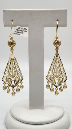 10K Gold Filigree earrings! Beautiful detailing around entire earring. Diamond cut for extra shine and brilliance. Perfect for anniversaries, weddings, night on the town and everyday wear!  Light weight and will not weigh down your ear. Traditional 14k Gold Pierced Jewelry, 14k Yellow Gold Pierced Diamond Earrings, Celebration Diamond Drop Earrings, Classic Gold Diamond Drop Earrings, Traditional 14k Gold Drop Earrings, Classic Formal Chandelier Earrings With Intricate Design, Formal 14k Yellow Gold Bridal Earrings, Classic Yellow Gold Bridal Earrings With Elegant Design, Luxury Drop Chandelier Earrings With Intricate Design