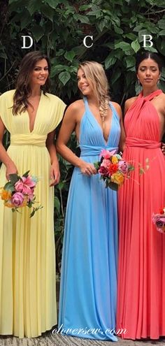 four women in different colored dresses standing next to each other with their names on them