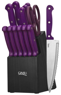 a purple knife is in a black box and it's opened up to show the blades