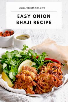 an easy onion bhaji recipe on a plate with some garnishes