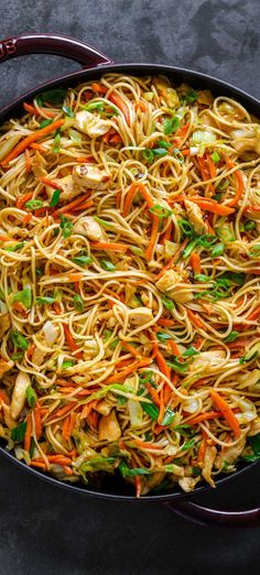 chow mein with chicken, carrots and noodles in a skillet text reads chow mein chow mein