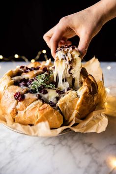 Cranberry Brie Pull Apart Bread - stuff with butter, brie, pecans and cranberries - bake, pull apart and eat! A total crowd pleaser! @ halfbakedharvest.com Cranberry Brie Pull Apart Bread, Brie Pull Apart Bread, Cranberry Baking, Vegetarian Thanksgiving Recipes, Half Baked Harvest Recipes, Thanksgiving Appetizer, Cranberry Brie, Pane Dolce, Vegetarian Thanksgiving