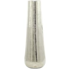 a tall silver vase sitting on top of a white table