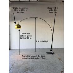 an image of a floor lamp with measurements for the base and light bulb on it