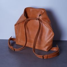 "Convertible backpack purse for women is made of genuine leather and can be transformed into a tote bag.  ✨ Gorgeous 2-in-1 bag. Suited be taken to shopping mall, restaurant or working place. The classic design would perfectly show your taste. Made of high-quality leather called Crazy Horse. 👀 You can wear it either as a shoulder bag or a backpack. 🔥 This accessory is completed with: -- two exterior pockets -- one interior pocket -- a spacious main compartment that secures with a zipper and magnetic clasp. ✅ Dimensions: 12.9 x 13.9 x 3.9 in / 33 x 35.5 x 10 cm; ✅ Exterior pockets: 13 x 6.3 in / 33 x 16 cm; ✅ Interior pocket: 9.8 x 8.2 in / 25 x 21 cm; ✅ Weight: 0.8 kg / 1.76 Ib. 🤍 Personalization All the details about personalization here: https://etsy.me/3u9IzB3 Key facts about the lea Daily Use Leather Tote Backpack With Removable Pouch, Everyday Convertible Leather Bag, Leather Convertible Bag For Daily Use, Tote Backpack Convertible, Leather Tote Backpack With Removable Pouch For On-the-go, College Backpack Women, Mall Restaurant, College Tote Bag, Convertible Tote Bag