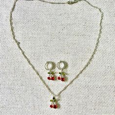 Summer Vibes Delicate Cherry Necklace And Earrings Silver Plated 925 Stamped Excellent Condition Never Used Red Dainty Sterling Silver Jewelry, Red Sterling Silver Dainty Jewelry, Dainty Red Sterling Silver Jewelry, Red Sterling Silver Necklace With Matching Earrings, Cherry Necklace, Cherry, Womens Jewelry Necklace, Silver Earrings, Jewelry Necklaces