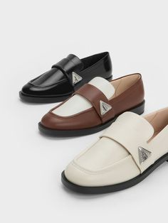 This product is made with at least 20% sustainable materials by weight. CHARLES & KEITH uses recycled, degradable, organic, and water-based materials in our eco-conscious collection. Timeless and elegant, these black Trice loafers will become a wardrobe staple in no time. Crafted with a boxed finish, this pair exudes a subtle shine for an ultra-polished and sleek look. It also features a triangular metallic accent that stands out against the all-black finish, adding a distinctive touch. Wear them with ruffled socks to create a preppy-with-a-twist aesthetic. Charles And Keith Shoes, Charles And Keith, Ruffled Socks, Online Shopping Shoes, Faux Leather Heels, Charles Keith, Low Block Heels, The Low, Black Box