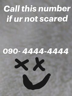 a sign that says call this number if ur not scared on the back of a cell phone