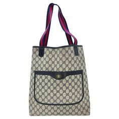 As stylish as it is spacious, this Gucci Vintage GG Monogram Sherry Tote is the perfect accessory for your everyday needs. Featuring the iconic GG Monogram coated canvas with leather trimming and gold-tone interlocking G logo, it offers a chic and versatile look. With a roomy navy interior and sturdy web fabric shoulder straps, this tote is in very good condition and is sure to elevate your style. Made in Italy, it's a true testament to Gucci's quality and craftsmanship. Designer: Gucci Material: GG Plus, Web Accent, Leather Trim Date/Authenticity Code: 904-02-003 Measurements: 12"W x 14"H x 5"D Strap Drop: 9.5" Interior Lining: Canvas Opening/Closure: Open Hardware: Gold-tone Includes: Entrupy COA Overall Condition: Very good pre-owned vintage condition with some minor residue to the inte Navy Interior, Tote Outfit, Gucci Vintage, Gucci Designer, G Logo, Gg Monogram, Bags Logo, Vintage Coat, Look Chic