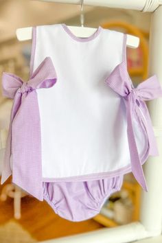 The possibilities are endless with this classic bloomer set from Cece Wells. Personalize it for their special occasions or everyday wear. Lavender Cotton Sets For Spring, Purple Cotton Sets For Summer, Purple Sleeveless Sets For Summer, Purple Ruffled Sets For Spring, Cute Purple Cotton Sets, Spring Purple Ruffled Sets, Cute Cotton Sets For Daywear, Cute Cotton Daywear Sets, Cotton Bloomers With Ruffles For Daywear