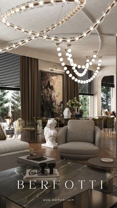 a living room filled with furniture and lots of lights hanging from the ceiling above it