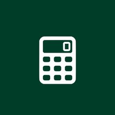 a white calculator on a green background