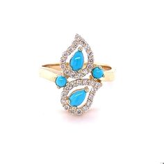 Turquoise and Diamond 14 Karat Yellow Gold Cocktail Ring Super pretty and dainty everyday ring that is sure to be a great addition to your accessory collection!! This ring has Pear and Round Cut Turquoise stones that weigh 0.47 Carats and 30 Round Cut Diamonds that weigh 0.33 Carats. (Clarity: SI2, Color: F). The total carat weight of the ring is 0.80 Carats. The ring is crafted in 14 Karat Yellow Gold and weighs 3.7 Grams.  The ring is a size 7 but can be ring sized free of charge, if needed. Turquoise Rings With Gemstone Accents In Fine Jewelry Style, Elegant Turquoise Rings In 14k Gold, Luxury Turquoise 14k Gold Ring, Elegant Yellow Gold Multi-stone Turquoise Ring, Elegant Turquoise 14k Gold Rings, Elegant Multi-stone Turquoise Ring In Yellow Gold, Turquoise Multi-stone Ring Fine Jewelry, Fine Jewelry Turquoise Multi-stone Ring, Elegant Turquoise Multi-stone Rings