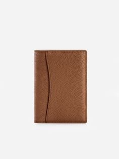 a brown leather wallet on a white background