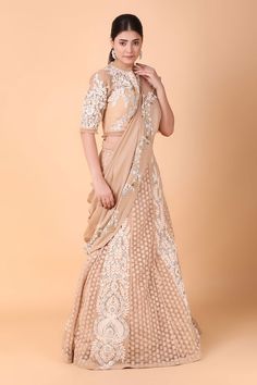 Beige pre-draped lehenga saree with floral jaal, flower vine embroidery using sequins, pearl, thread and cutdana work. Paired with a blouse with floral lace embroidery. Comes along with a petticoat. - Aza Fashions Flower Vine Embroidery, Draped Lehenga, Drape Lehenga, Petticoat Pattern, Vine Embroidery, Cutdana Work, Saree And Blouse, Lehenga Saree, Embroidery Floral