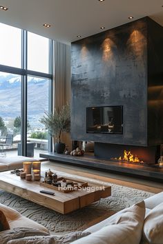 a living room with large windows and a fire place