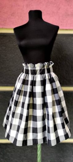 New designer skirt from our shop. It's made from beautiful soft plaid fabric. With elastic on the waist so fits all sizes. Length - 70 cm Summer Plaid Pleated Skirt, Plaid Cotton Lined Skirt Bottoms, Casual Gingham Gathered Skirt, Plaid Lined Skirt For Spring, Summer Plaid Flared Skirt, Spring Plaid Lined Skirt, Chic Pleated Plaid Skirt, Spring Plaid Ruffled Skirt Bottoms, Plaid Lined Skirt Bottoms For Spring