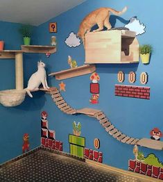 a cat sitting on top of a shelf in a room decorated with mario bros decorations