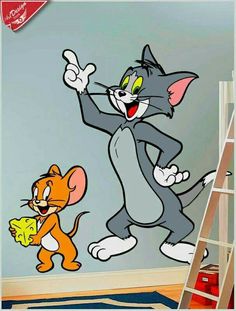 a cartoon cat and mouse wall decal in a child's room with a ladder