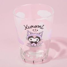 a shot glass with an image of a cat on it