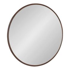 a round mirror with a brown frame on a white background, it's reflection in the mirror