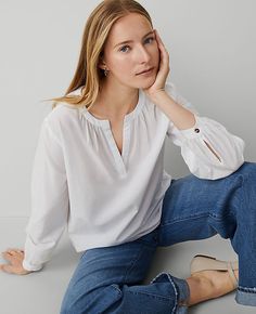 Elevate your weekend wardrobe with the Ann Taylor Weekend Cotton Blend Popover Top. This piece is the epitome of effortless style, designed to make your casual days chic and comfortable. 

- **Size**: Regular - Small
- **Color**: White
- **Material**: 59% Cotton, 41% Viscose
- **Gender**: Female
- **Fit**: Blousy - our most relaxed fit
- **Sleeve Length**: Long sleeves with button cuffs
- **Neckline**: Split neck with shirring detail
- **Length**: 25 1/4" long
- **Care**: Machine washable

This Chiffon Tops Blouses Classy, Weekend Clothing, Blue Clothes, Chiffon Tops Blouses, White Cotton Blouse, Weekend Outfits, Casual Weekend, Weekend Wardrobe, Petite Tops