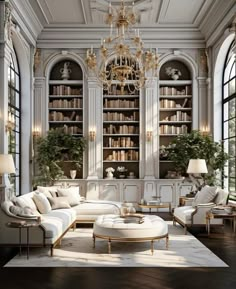 a living room filled with lots of white furniture