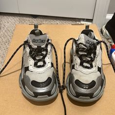 Kid's Triple S Metallic Chunky Sneakers Size 30 Mint Condition Need New Shoe Strings And A Scrub These Are Still Going For Pretty Penny On Various Websites Like The Goat And Similar Sites Trendy Gray Chunky Sneakers For Streetwear, Balenciaga Shoes, The Goat, Chunky Sneakers, New Shoes, Mint Condition, Kids Shoes, Penny, Balenciaga