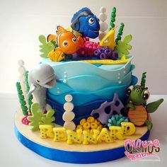 a birthday cake decorated with an ocean theme