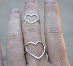 I’d been craving some light & delicate sterling rings for everyday wear, so I made this pretty heart ring along with a range of these ultra feminine & romantic rings.  There are a few different styles like this in my shop - each equally dainty, pretty & eye catching!-d e s c r i p t i o n-I’ve used hand drawn (1.3mm thick) sterling wire to create these rings from scratch.  Each shape is hand forged, so will be completely unique.  The ring has been finished in a shiny mirror finish.More rings are Delicate Sterling Silver Heart Ring, Simple Silver Open Heart Jewelry, Simple Open Heart Silver Jewelry, Dainty Open Heart Stackable Rings As Gift, Minimalist Sterling Silver Stackable Rings For Valentine's Day, Silver Dainty Open Heart Ring, Dainty Silver Open Heart Ring, Simple Handmade Stackable Rings, Handmade Minimalist Open Heart Jewelry