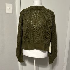 Green / Olive Knitted Sweater New With Tags - Never Worn Waist Length Size Small - But Can Fit Like A Medium Green Textured Knit Cropped Sweater With Crew Neck, Casual Open Knit Cropped Sweater, Open Knit Crew Neck Sweater, Green Knit Cropped Sweater With Crew Neck, Green Open Knit Crew Neck Top, Green Crew Neck Open Knit Top, Casual Cropped Open Knit Sweater With Crew Neck, Fall Pointelle Knit Cropped Sweater, Green Pointelle Knit Sweater